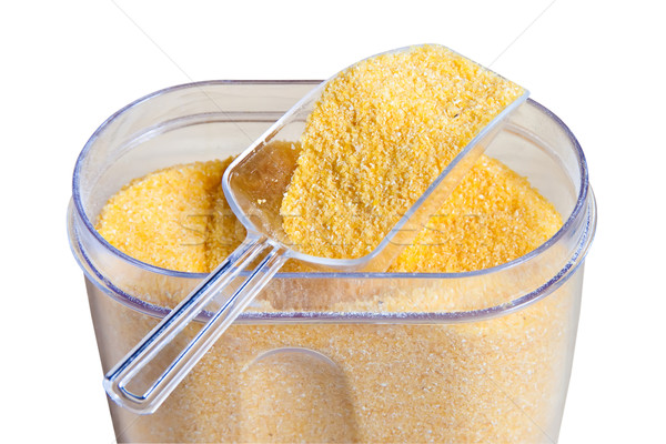 Stock photo: Corn grits isolated on a white background.
