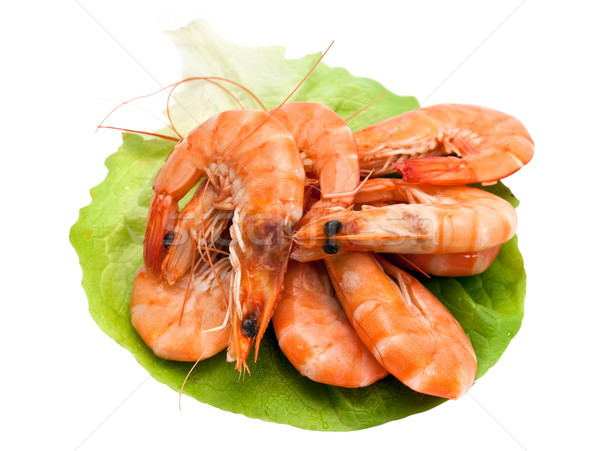 Fresh shrimp on lettuce leaf, isolated on a white background Stock photo © g215