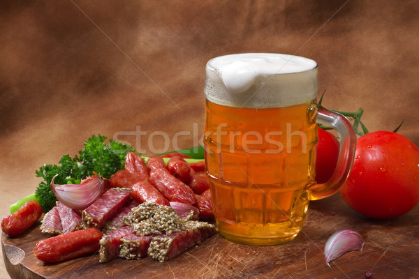 Still life with beer and salami Stock photo © g215