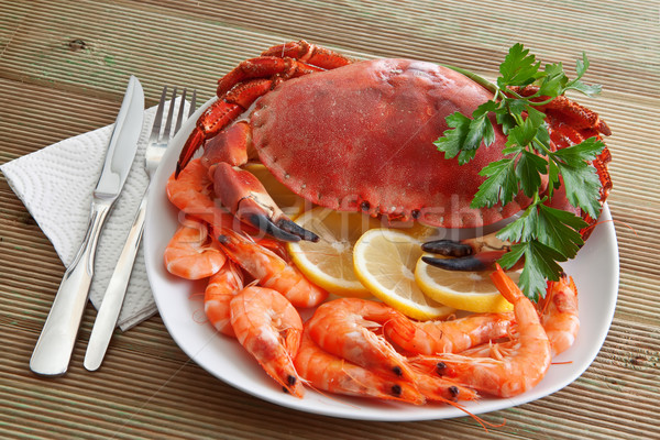 Crab with shrimp and parsley on a wooden table  Stock photo © g215