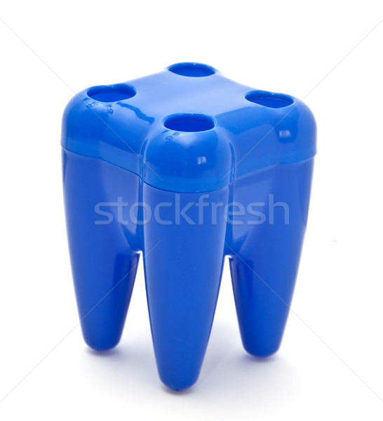 Blue glass for toothbrushes Stock photo © g215