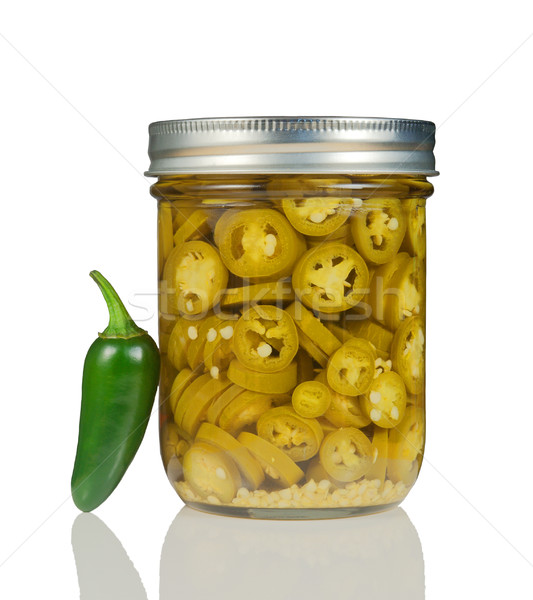Sliced Jalapenos (Capsicum Annuum) in a Glass Jar on White Stock photo © gabes1976