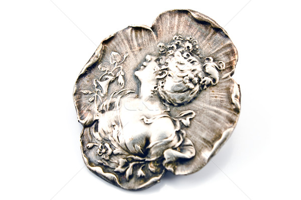 Antique silver brooch with woman's profile  Stock photo © gavran333