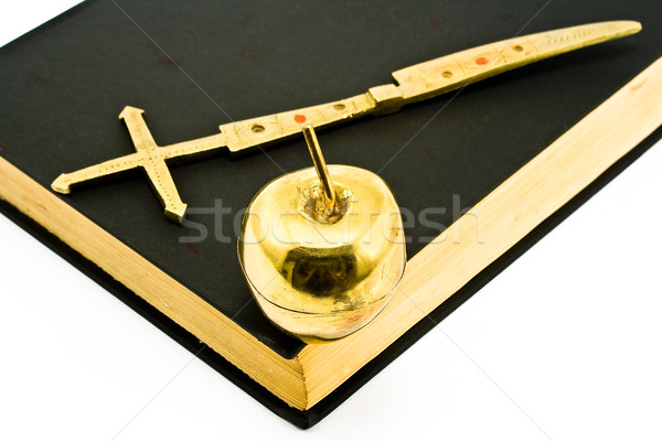 Golden Cross and Apple on Bible Stock photo © gavran333