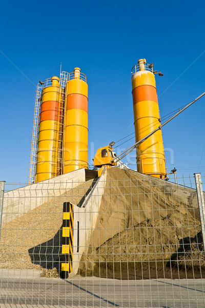 Yellow concrete silos over blue sky Stock photo © gavran333