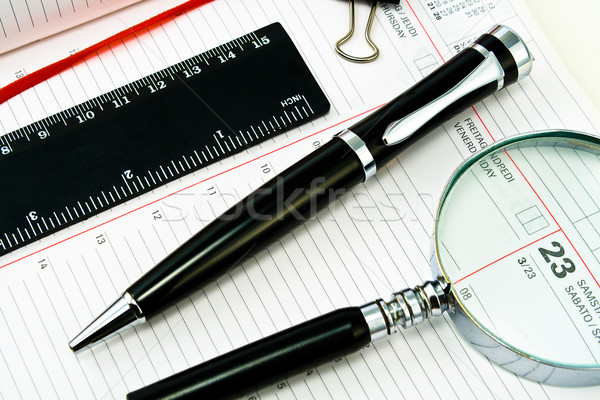Pen and Agenda with a tools of punctuality Stock photo © gavran333