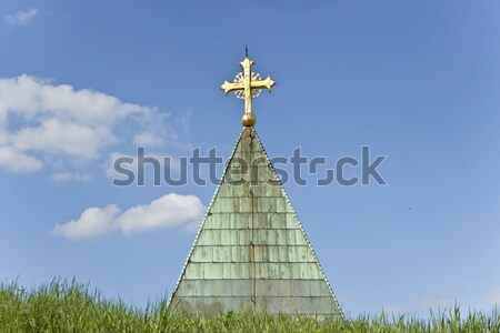 Golden cross on a blue sky Stock photo © gavran333