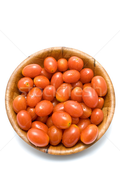 Plum tomatoes in wooden dish Stock photo © gavran333