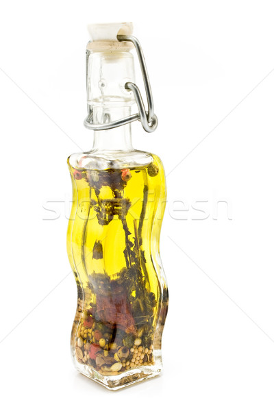 Olive oil bottle with spices Stock photo © gavran333