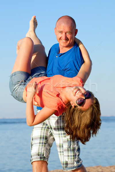 Feliz Pareja playa vacaciones agua Foto stock © Gbuglok