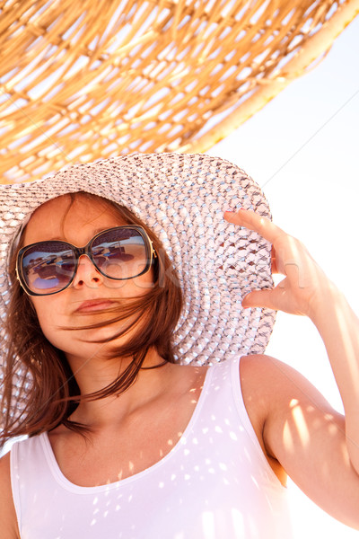 Nina sombrero verano joven relajante playa Foto stock © Gbuglok