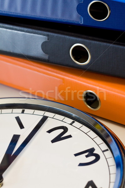 Clock and binders Stock photo © Gbuglok
