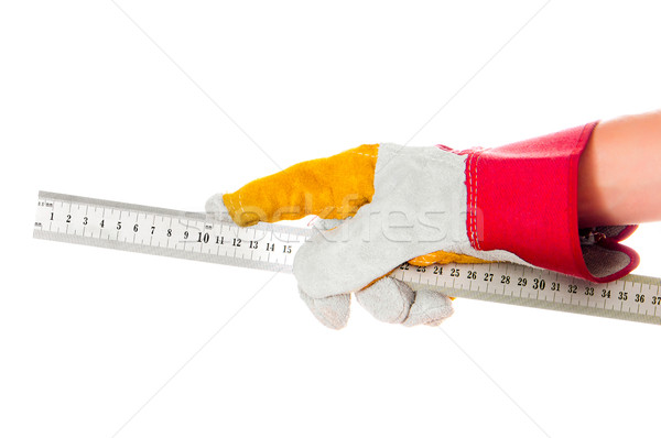 gloved hand with ruler Stock photo © GekaSkr