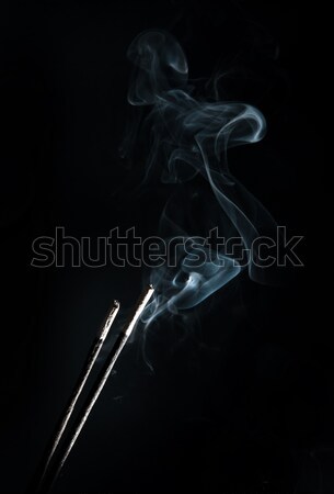 Incenso fumar preto fogo fundo azul Foto stock © GekaSkr
