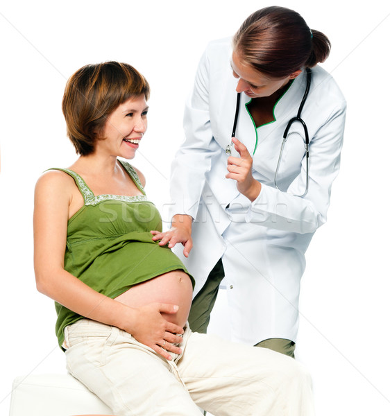 Medic femeie gravida zâmbitor alb fată fericit Imagine de stoc © GekaSkr