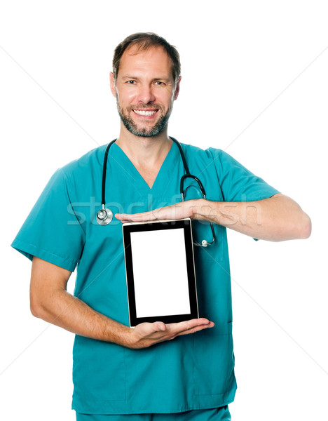 doctor holding blank tablet Stock photo © GekaSkr