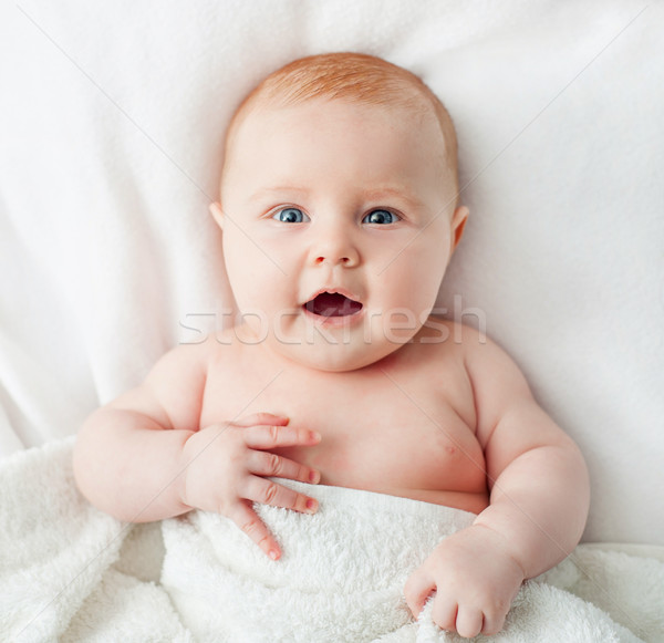 Adorable bébé blanche lit couverture [[stock_photo]] © GekaSkr