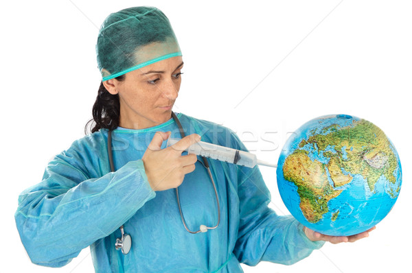 Attractive lady doctor curing the ill world Stock photo © Gelpi