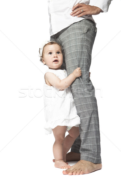 Happy baby at fathers legs Stock photo © gemenacom