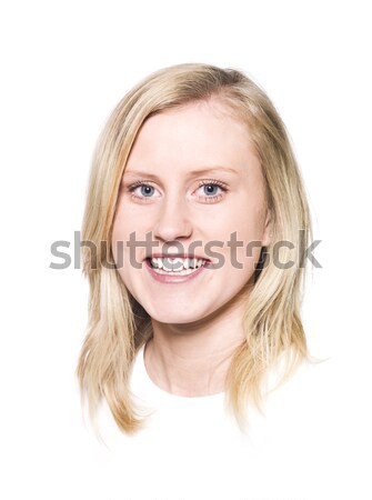 Nina sonrisa con dientes aislado blanco mujer retrato Foto stock © gemenacom