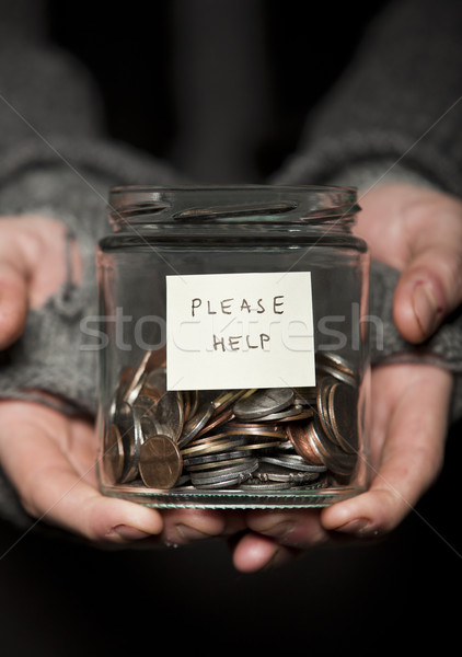 Ajutor mâini borcan monede dolar Imagine de stoc © gemenacom
