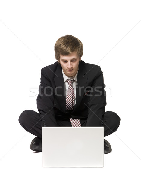 Man sitting on the floor with a computer Stock photo © gemenacom
