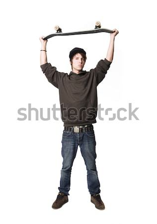 Stock photo: Boy with a skateboard