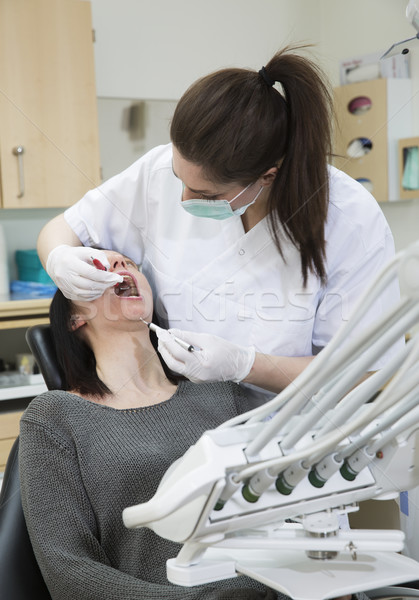 Feminino dentista paciente situação mulheres macro Foto stock © gemenacom