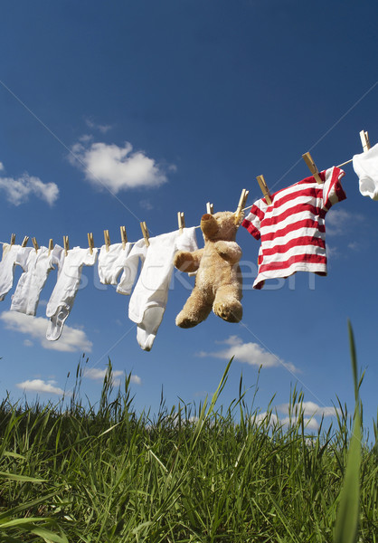 Baby clothing on a clothesline Stock photo © gemenacom