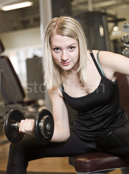 Jonge vrouw gewichten fitness centrum man Stockfoto © gemenacom