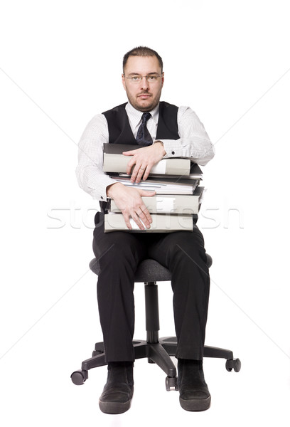 Man with binders sitting on a chair Stock photo © gemenacom