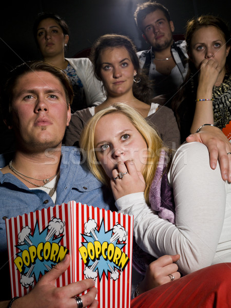 Stock photo: Young couple at the cinema