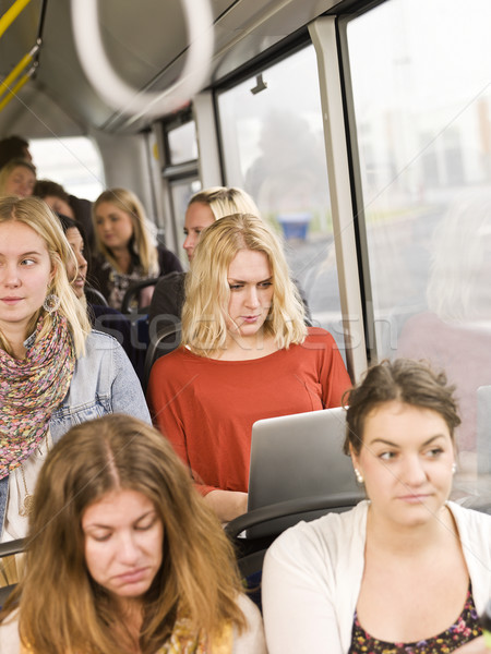 Komoly nő busz számítógép ablak lányok Stock fotó © gemenacom