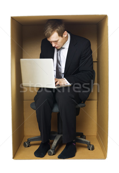 Businessman in a tight office Stock photo © gemenacom