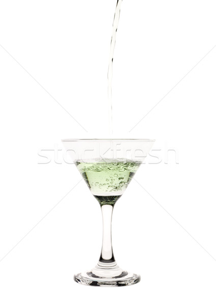 Green liquid pouring into a martini glass. Stock photo © gemenacom