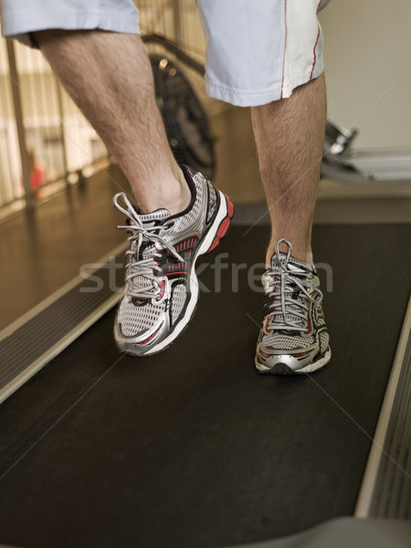 Man lopen tredmolen vrouwen trein machine Stockfoto © gemenacom