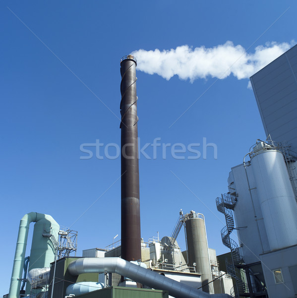 Chimney against a blue sky Stock photo © gemenacom