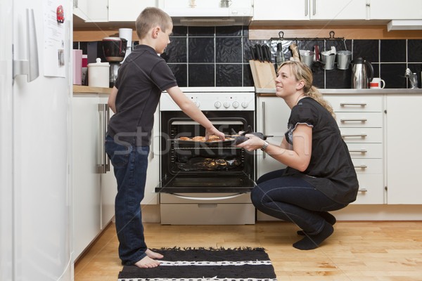Mother and son in kitchen Stock photo © gemenacom