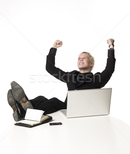 Happy boy siting infront of a computer Stock photo © gemenacom