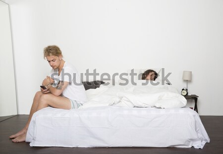 Bed problemy smutne człowiek żona seks Zdjęcia stock © gemenacom