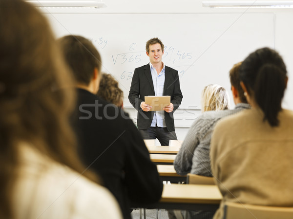 Teacher in classroom Stock photo © gemenacom