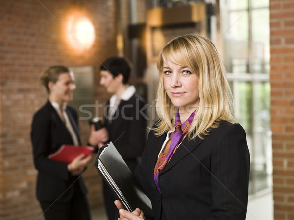 Businesswoman in front of two women Stock photo © gemenacom