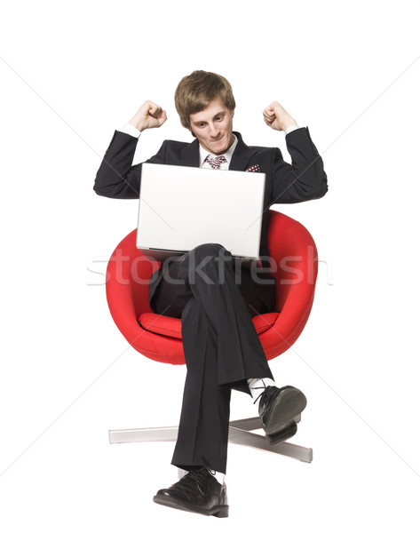 A happy boy with a laptop Stock photo © gemenacom
