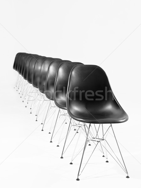 Czarny krzesła rząd odizolowany biały biuro Zdjęcia stock © gemenacom