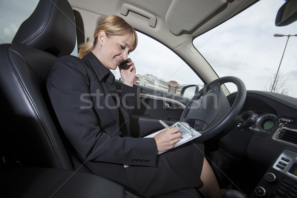 деловая женщина календаря автомобилей рабочих улыбаясь вождения Сток-фото © gemenacom