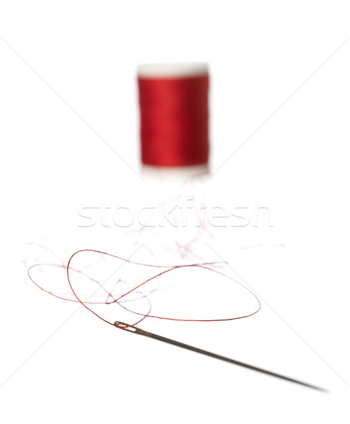 Rojo hilo color coser aguja Foto stock © gemenacom