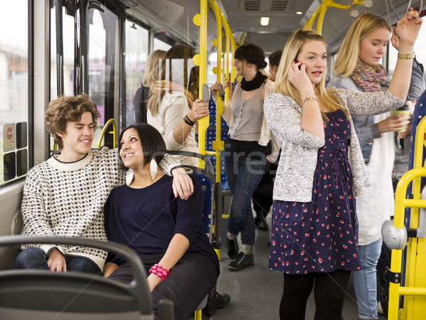 Boldog pár busz nagyobb csoport emberek lány Stock fotó © gemenacom