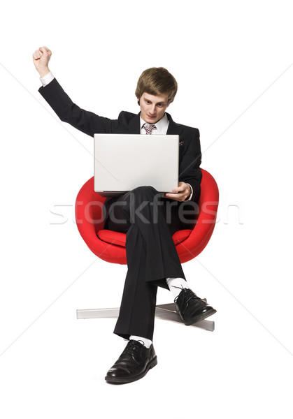 A happy boy with a laptop Stock photo © gemenacom