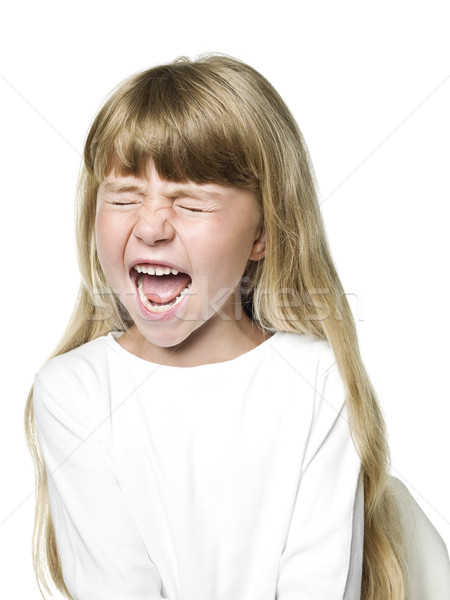 Urlando ragazza ritratto bambino bianco sorridere Foto d'archivio © gemenacom