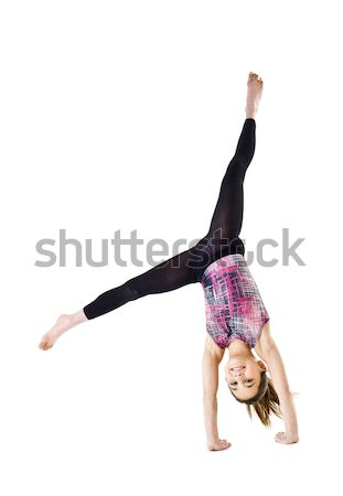 Gimnastica fată tineri izolat alb copil Imagine de stoc © gemenacom
